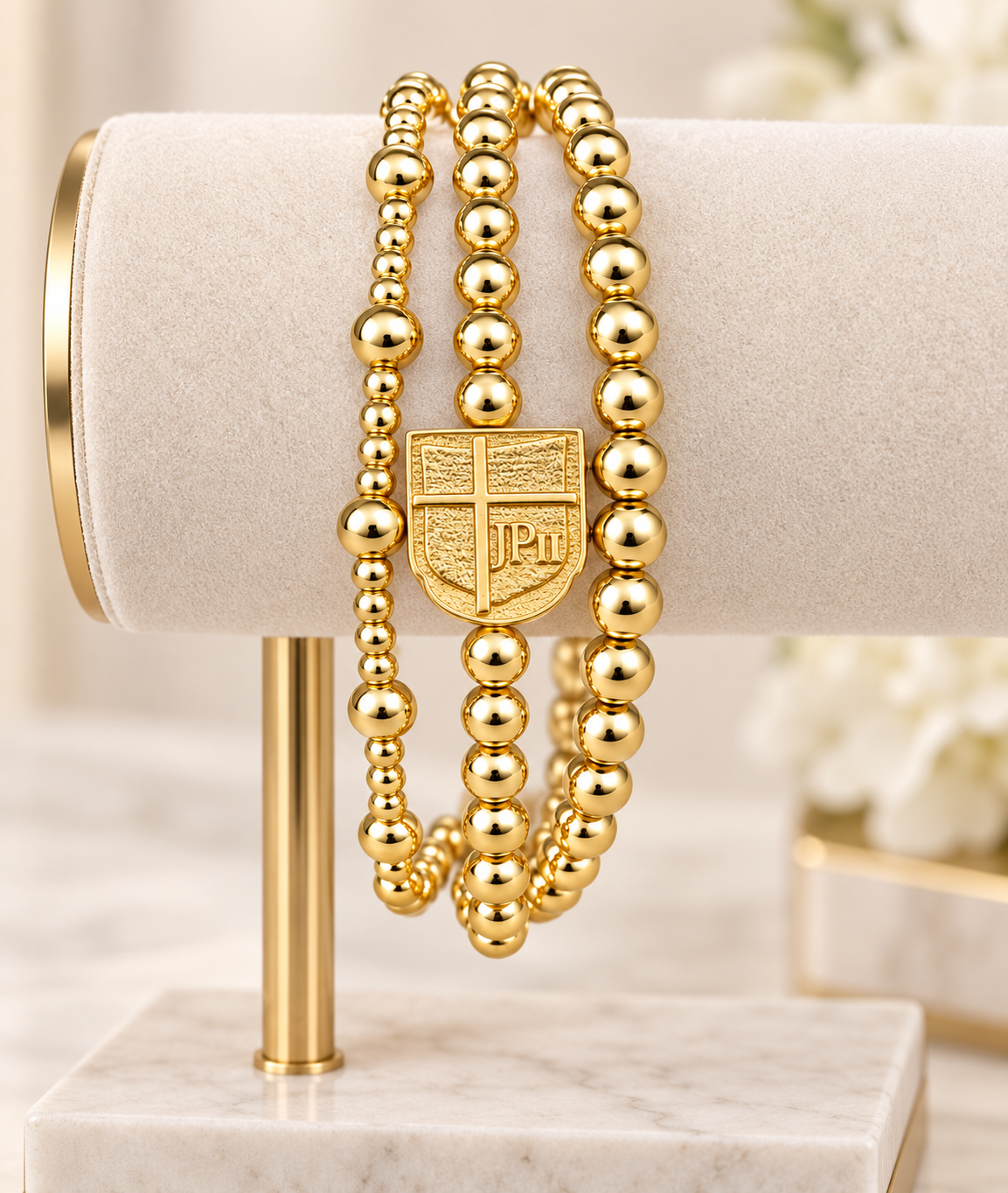 3 Gold Bracelets with JPII Shield
