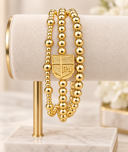 3 Gold Bracelets with JPII Shield